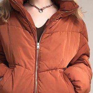 burnt orange puffer jacket
